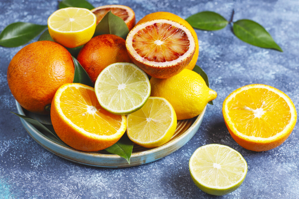 assorted fresh citrus fruits lemon orange lime blood orange fresh colorful top view