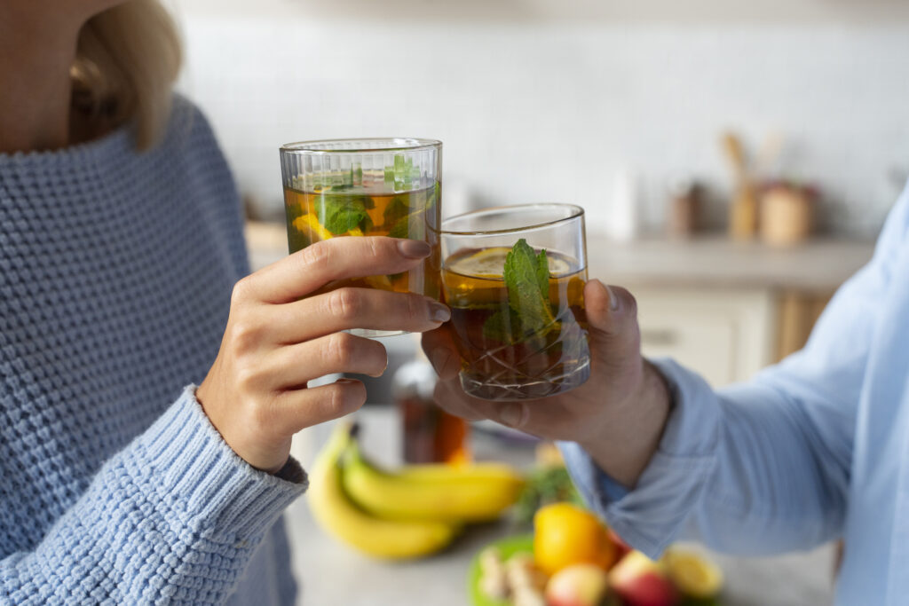 side view people clinking glasses