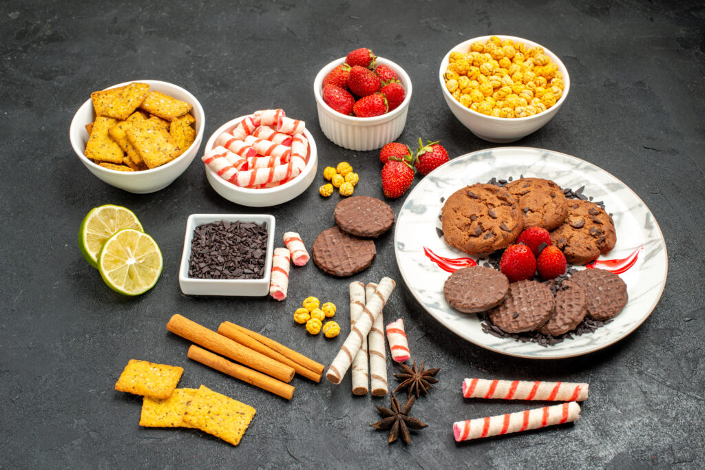 7 Proven Ways to Improve Gut Health Naturally for Better Digestion 7 front view yummy choco biscuits with different snacks